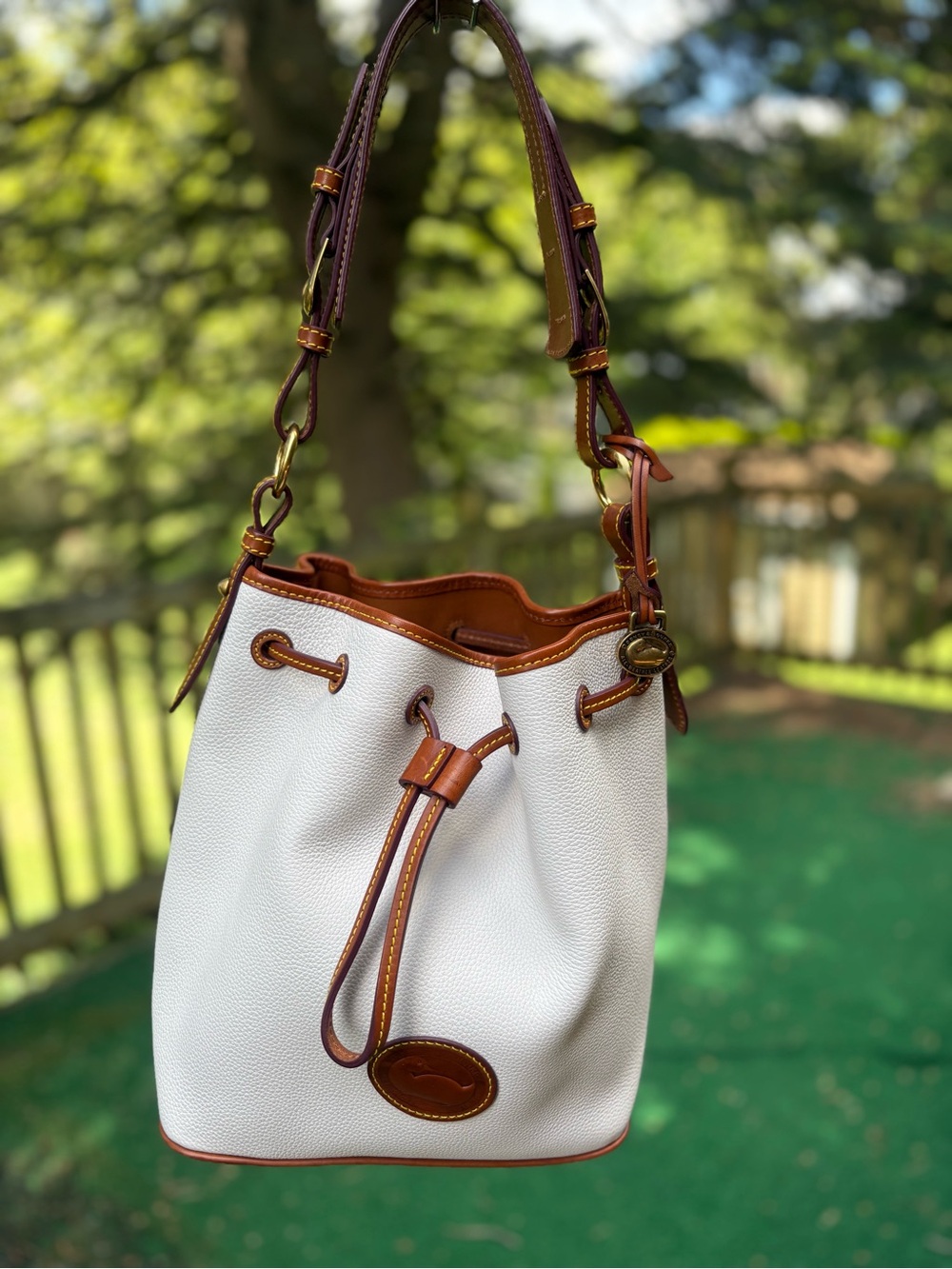 Dooney and Bourke All Weather Leather 3.0 Drawstring 25 Vanilla